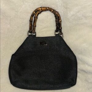 SIMONELLI BRAND BLACK HAND BAG WITH BAMBOO LIKE(ACRYLIC) HANDLES SNAP CLOSURE